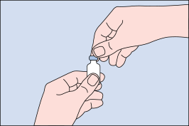 Figure B: Image of hand removing orange plastic cap from vial