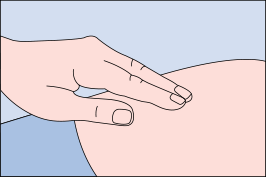 Figure L: Image of pressing on injection site when needle is removed